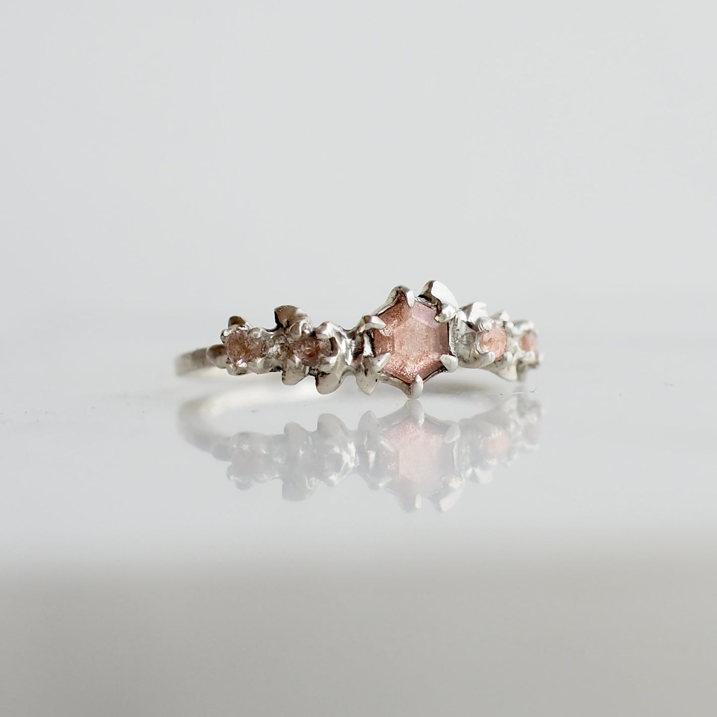 Hexagonal Oregon Sunstone floral wreath ring in sterling silver made by Iron Oxide Designs, One of a kind