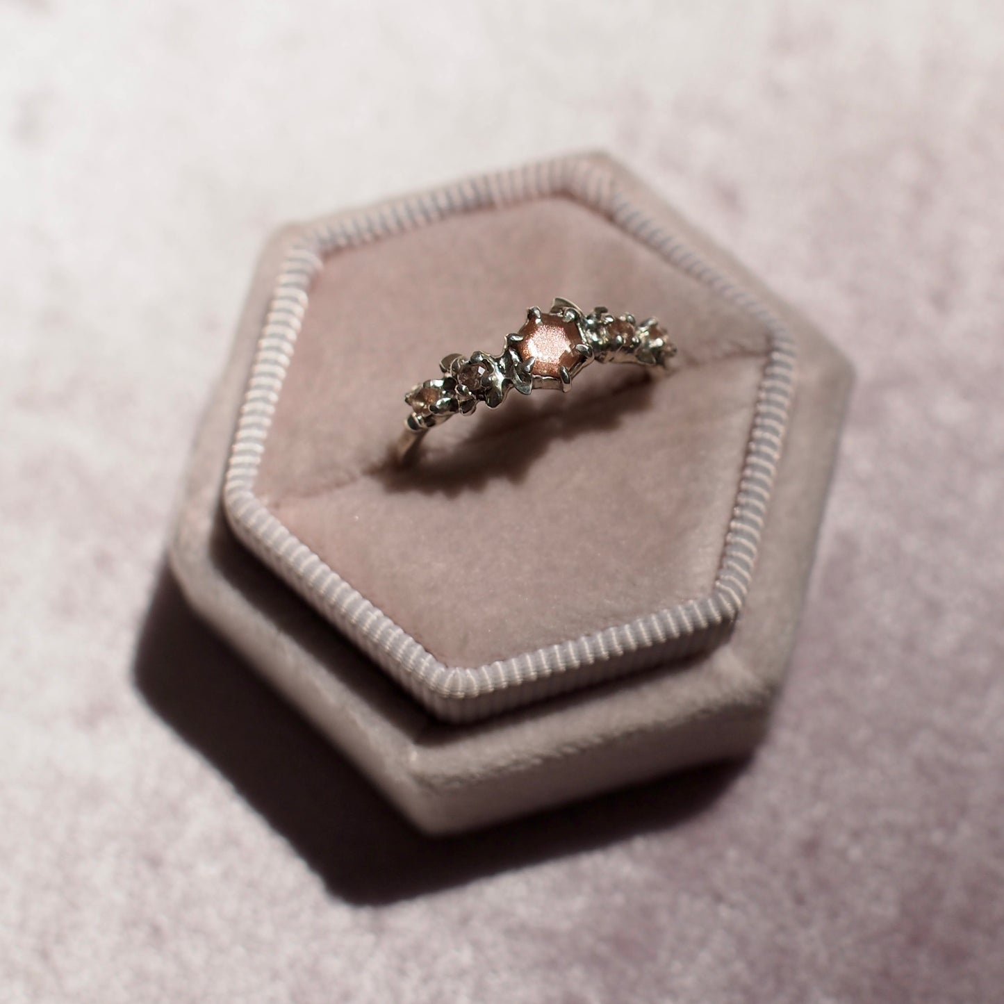 Hexagonal Oregon Sunstone floral wreath ring in sterling silver made by Iron Oxide Designs, One of a kind