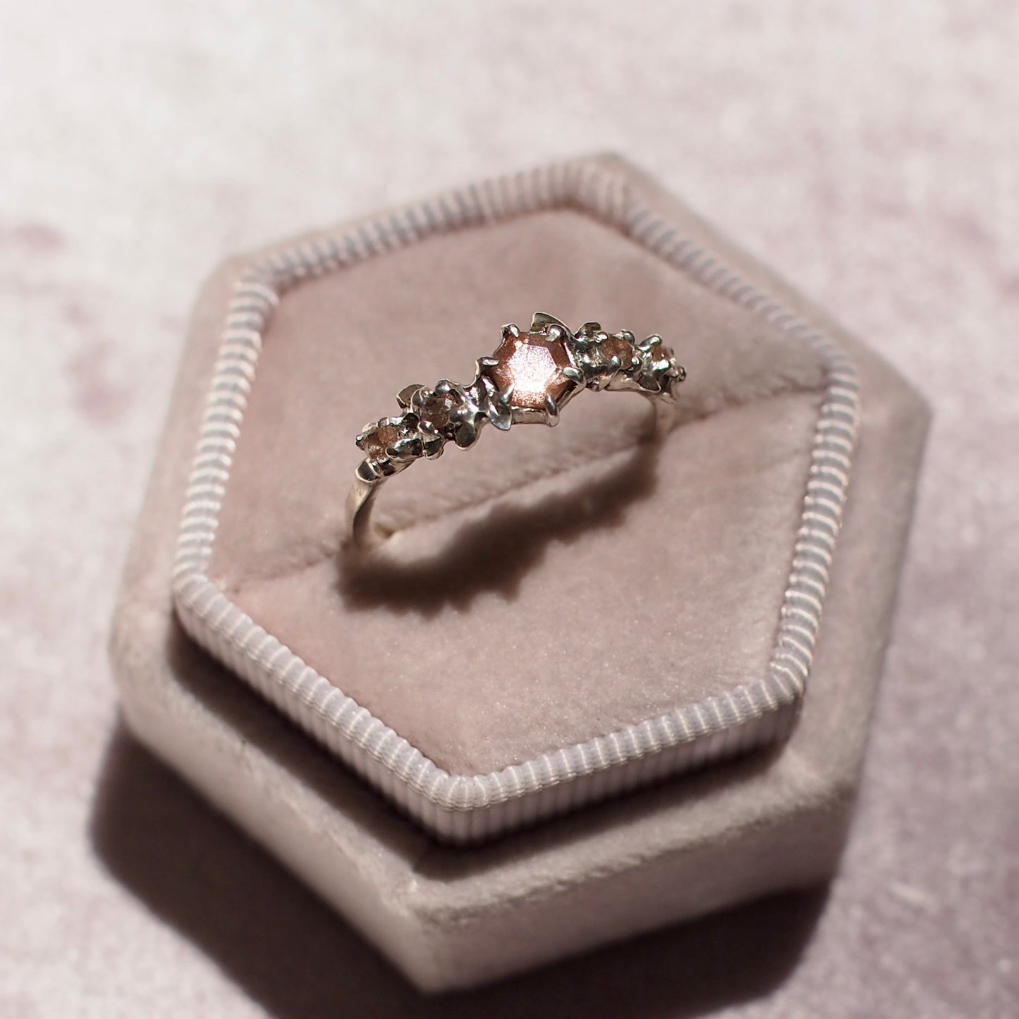 Hexagonal Oregon Sunstone floral wreath ring in sterling silver made by Iron Oxide Designs, One of a kind