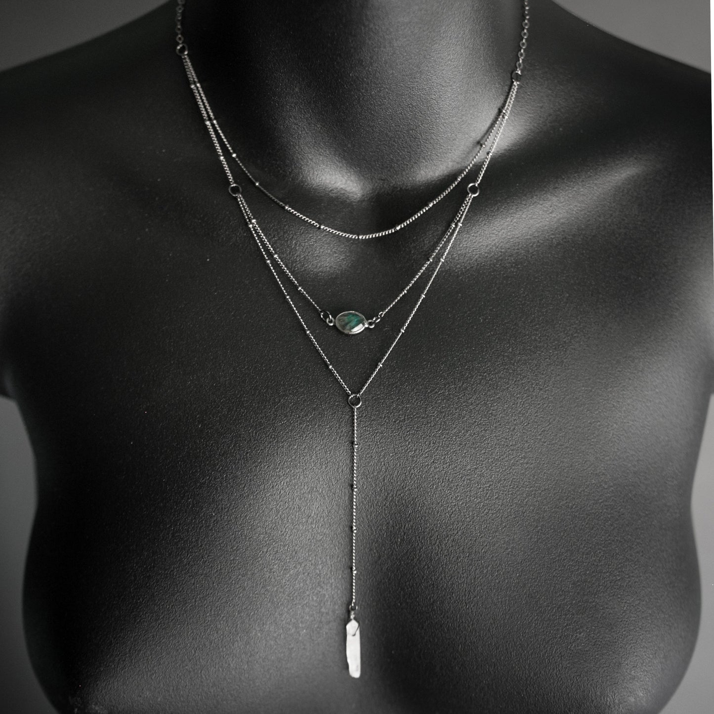 Layered Labradorite Lariat Necklace with crystal drop set on a dotted gunmetal chain