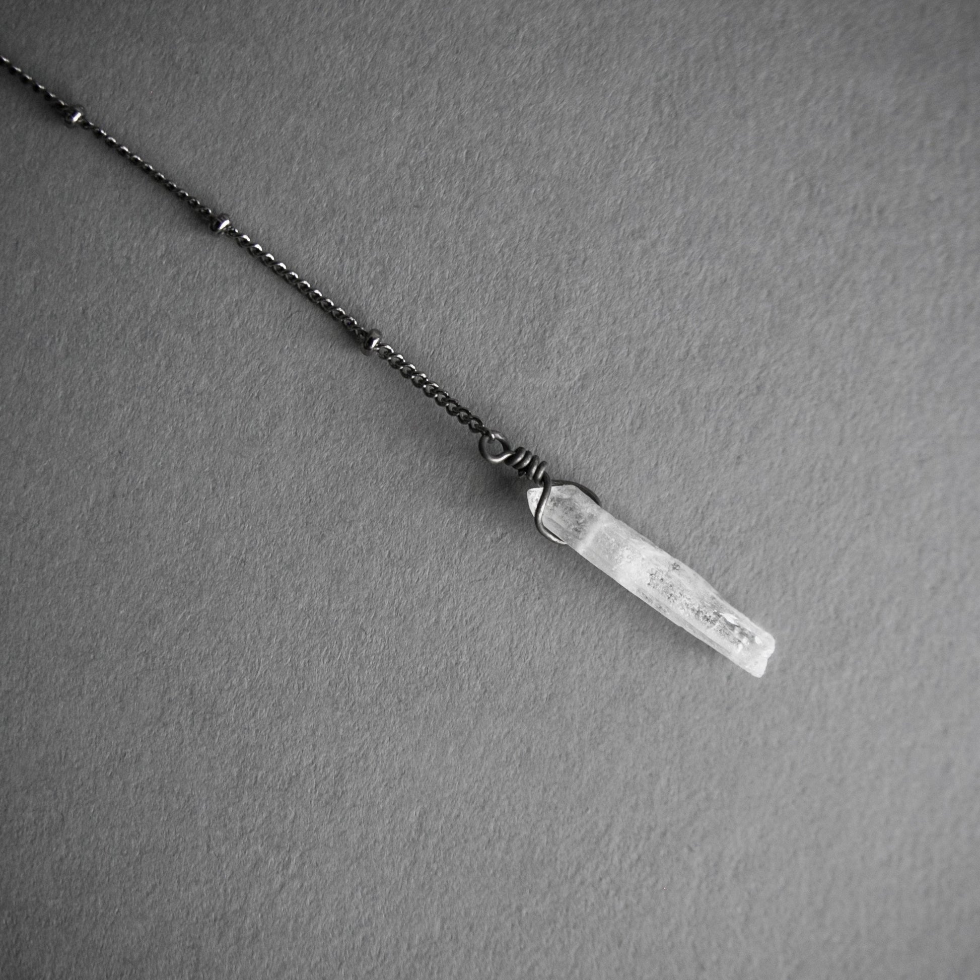 Layered Labradorite Lariat Necklace with crystal drop set on a dotted gunmetal chain