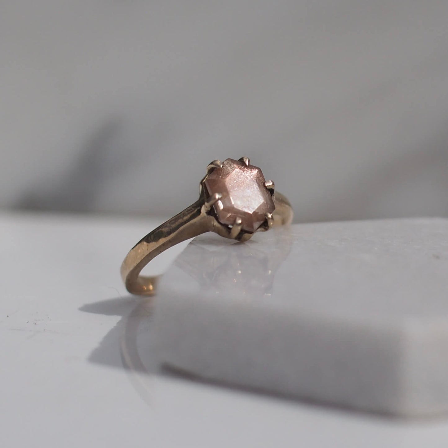 Shimmery Oregon Sunstone hexagonal ring gold tone bronze, handmade by Iron Oxide Designs