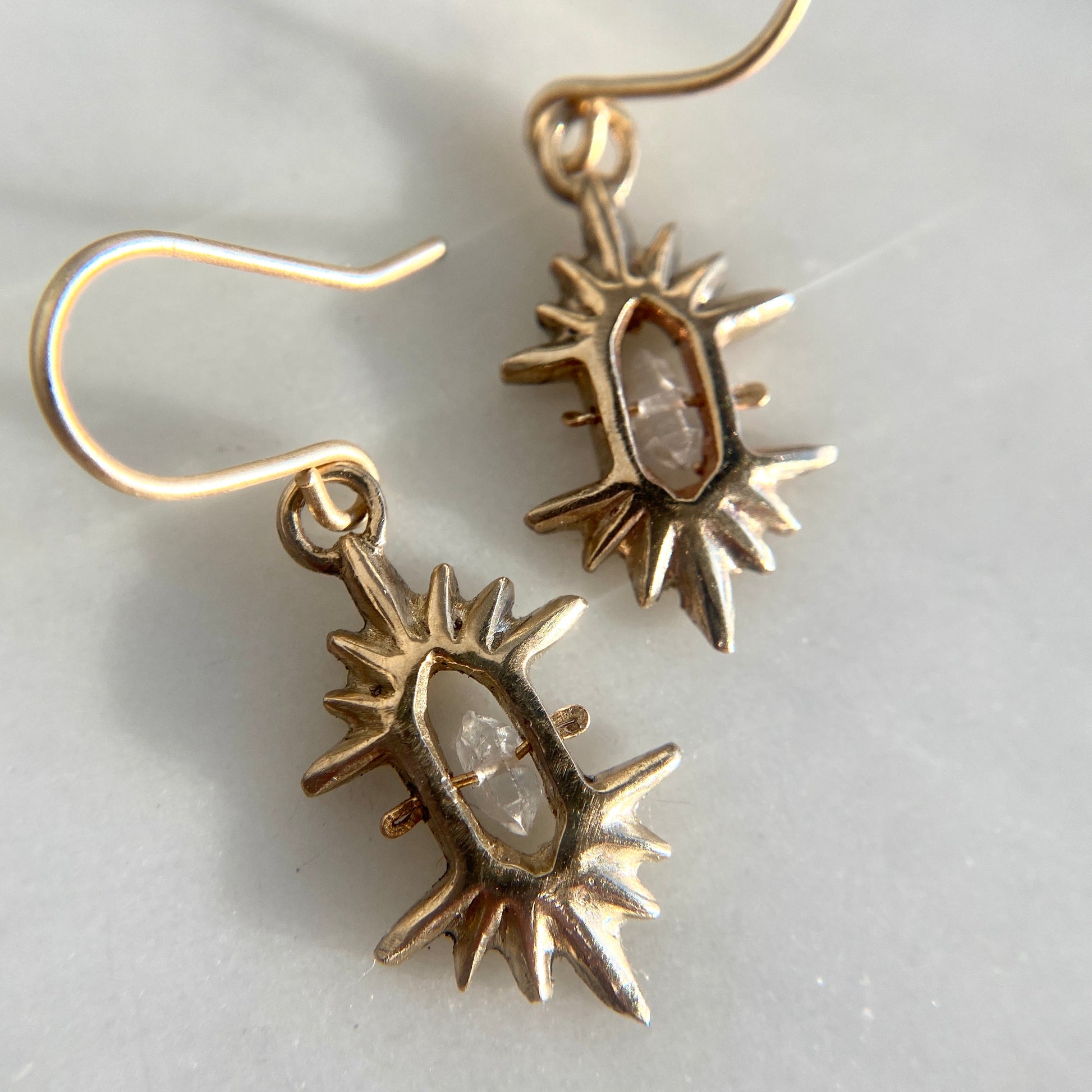 Crystal Sunburst Earrings in Gold tone bronze from Iron Oxide
