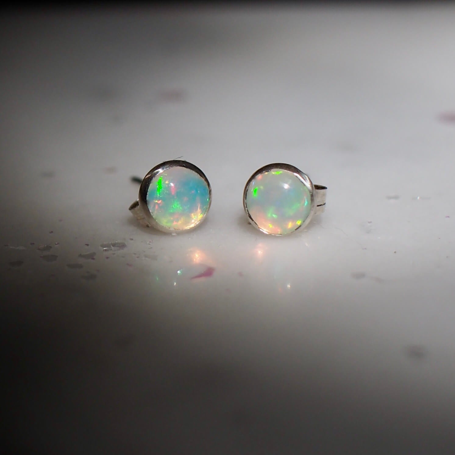 Sustainably sourced opal stud earrings in sterling silver and gold fill