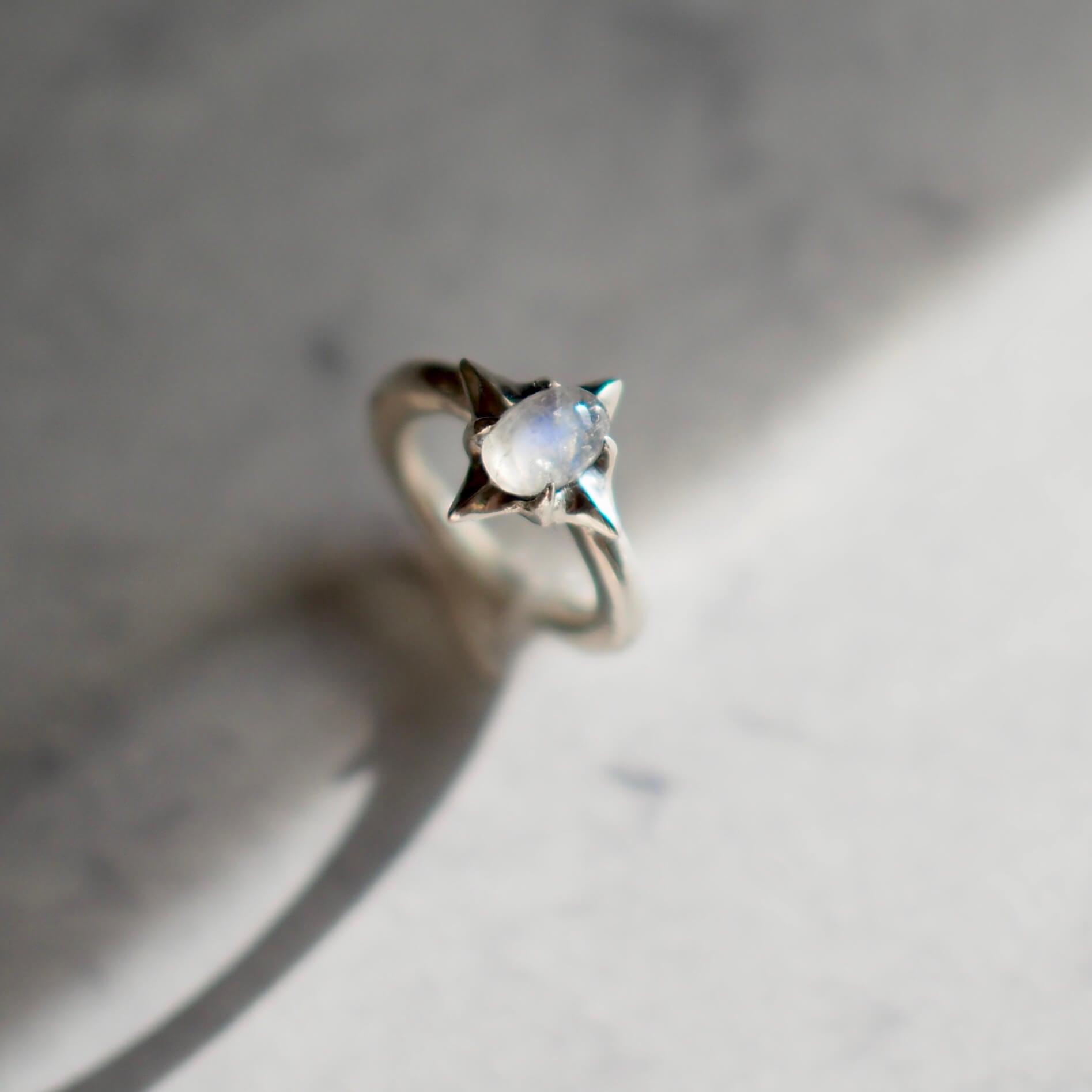 Ethically sourced moonstone star ring set in sterling silver from Iron Oxide Designs.