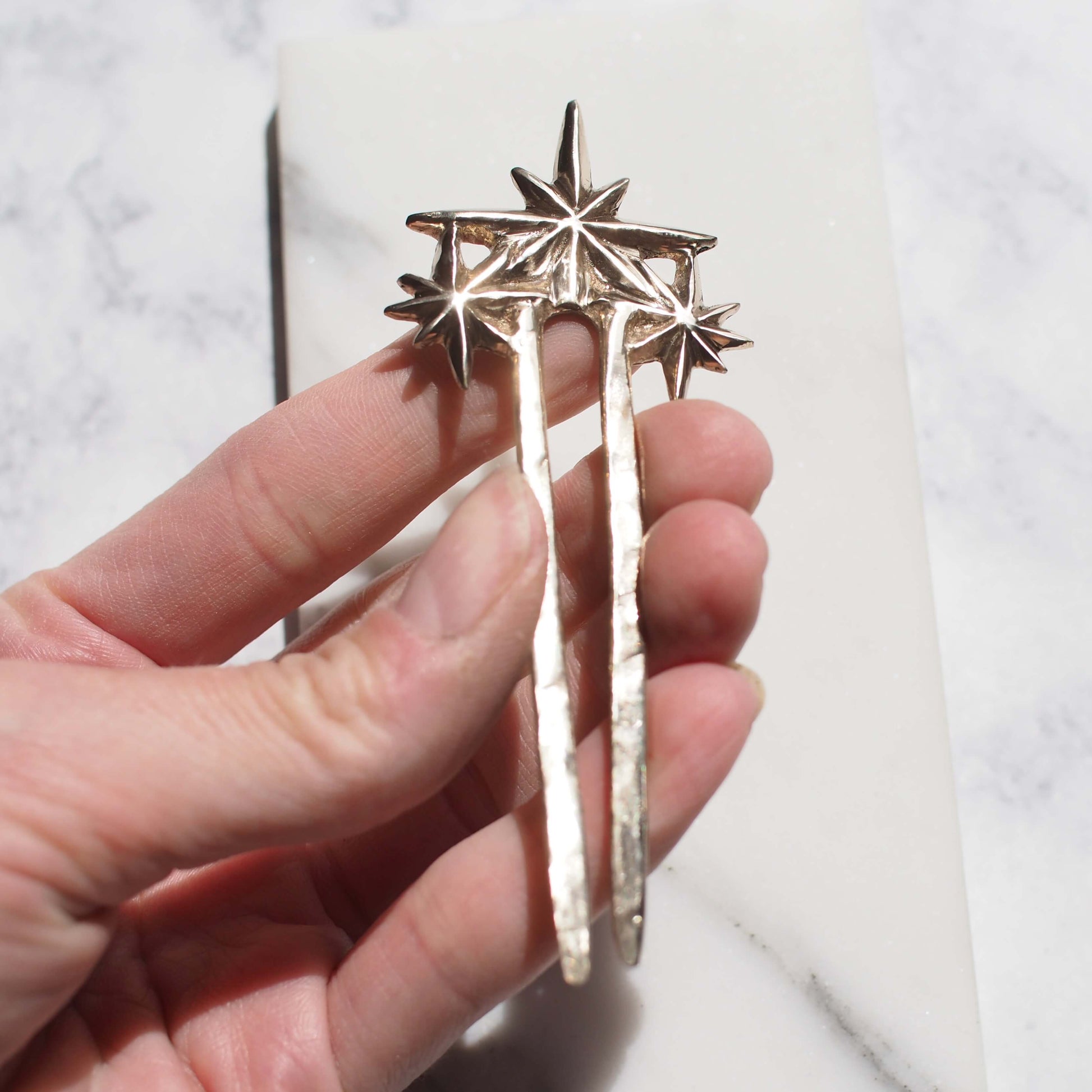 Shiny Constellation Star Hair Pin, cast in gold tone bronze, handmade in the USA by Iron Oxide  Edit alt text