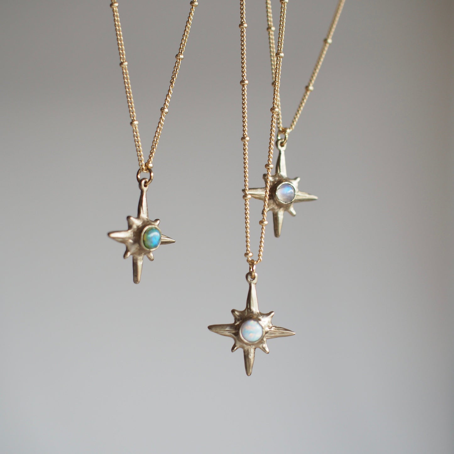 Hanging Shiny Gold Iron Oxide North Star Polaris Necklaces