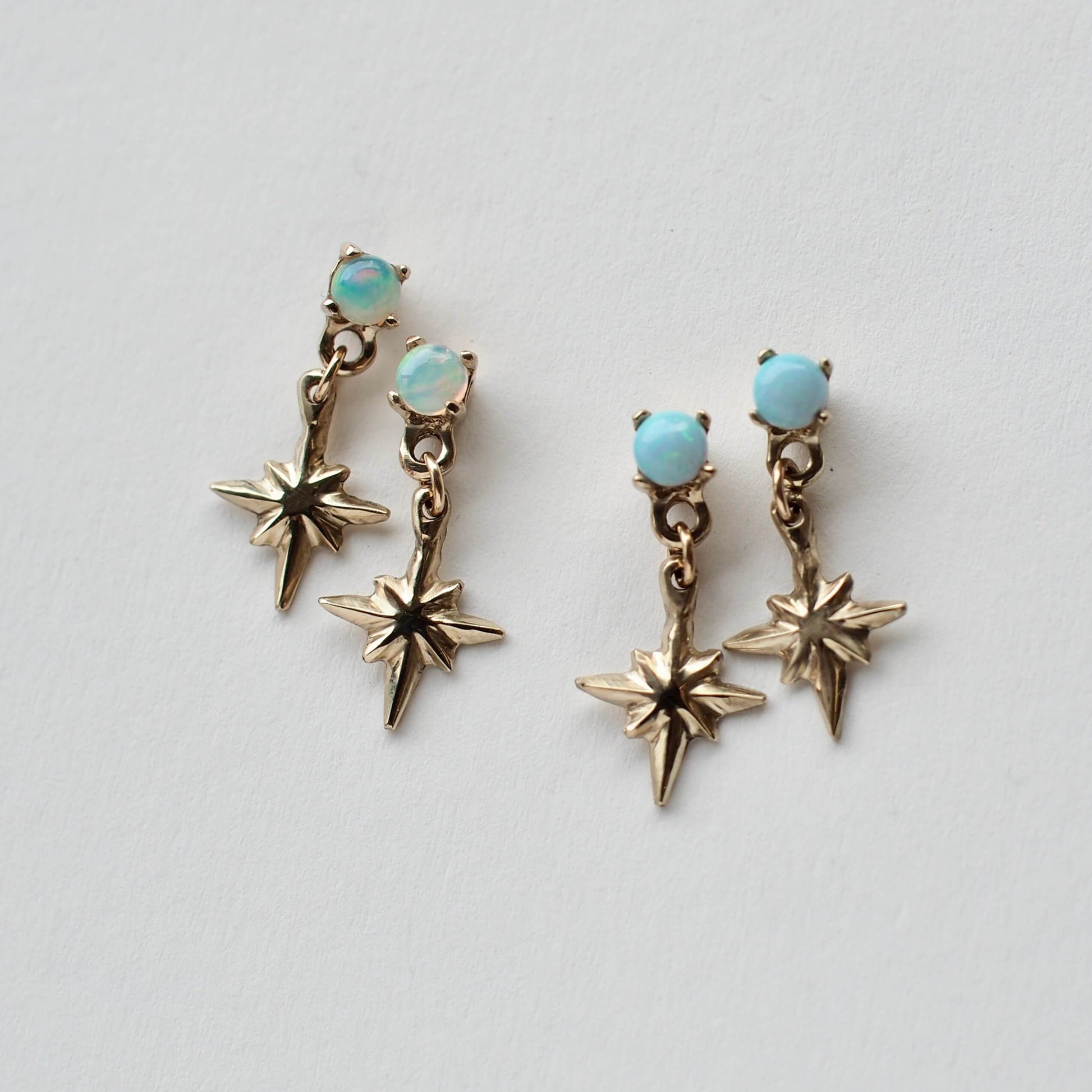  Tiny star dangle earrings in gold tone bronze and sterling silver, set with natural and synthetic opals